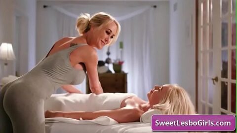 Naughty busty blonde lesbo masseuse seduces her young horny client and finger fuck her juicy pussy