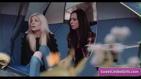 See these lovely lesbo hot girls hike in the forest and making out in their tent