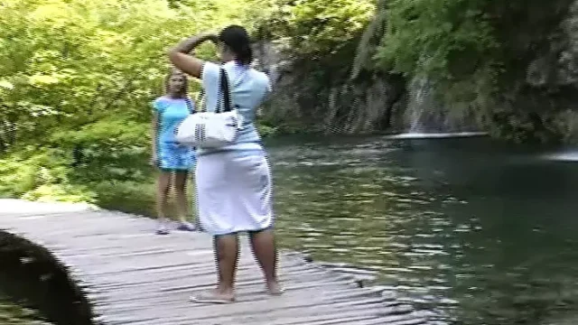 Stunning German lesbians pleasing their pussies on the beach