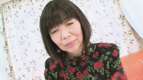Asian MILF enjoys a big cock