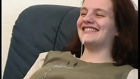 Young babe sucks a hard cock to a mouth cumshot on the sofa