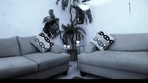 Hungry slut with perky tits gets double penetrated by two fit hunks on the sofa