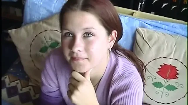 Young brunette strips and gives hard cock a hungry blowjob