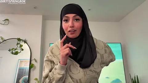 Cute Hijabi sucks a white cock whilst her parents are upstairs
