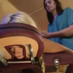 Lesbian masseuse fucks a sexy blonde client with a strapon